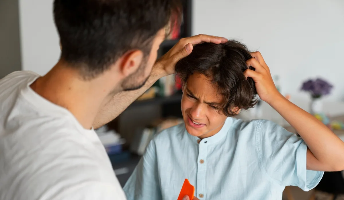 Lice specialist helping child