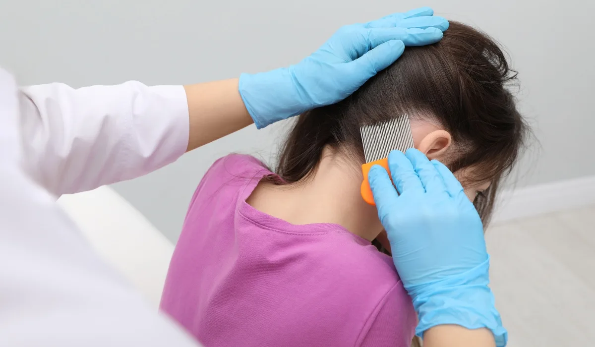 child at lice treatment center